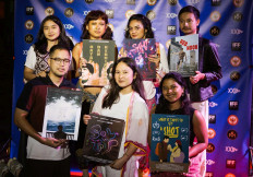Showcase: Young Indonesian filmmakers pose with posters of their movies during "XXINY Take 1: Indonesian Film Night", held on Aug. 24, 2025, at The Brooklyn Monarch in New York, the United States. They were (clockwise, from top left) producer Emeralda Kalyana; directors Prameswari Brajabwana and Chandni; director and editor Gusti Cakramurti; actress Anne Yasmine; actress and director Namirah Zihniah; and director and editor Jovann Dzaky.