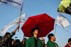 University students shout slogans during a protest against lawmakers' pay and housing allowances, outside the House of Representatives building in Jakarta on Sept. 1, 2025. 