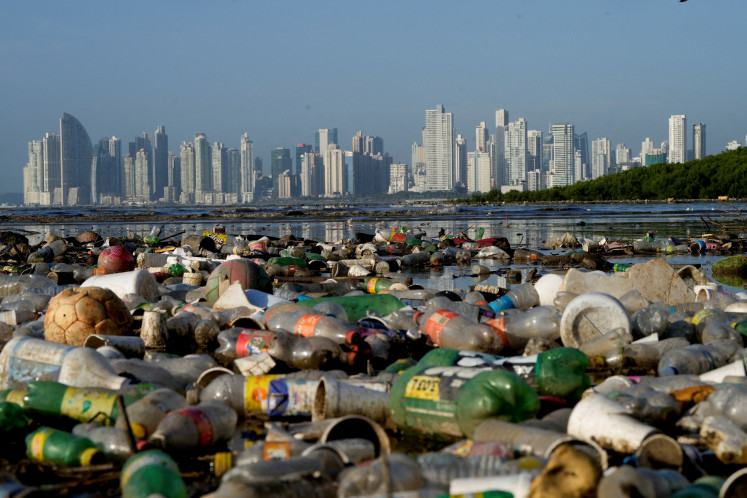 Plastic polluting a mangrove area lies in Panama Bay, Panama City, on Dec. 6, 2024.
