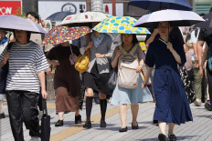 Japan revises Q2 GDP higher on upbeat consumer spending
