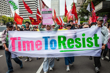 Activists from Gerakan Buruh Bersama Rakyat (Gebrak), an alliance between labor unions and civil groups, join a peaceful march along Jl. Thamrin in Central Jakarta on Sept. 4, 2025, to during protests against police brutality and repression in several major cities across the country.