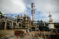 Low clouds hang over industrial installations on March 24, 2025, at the Kem One petrochemical plant in Fos-sur-Mer, Southern France. (AFP/Getty Images/Clement Mahoudeau)