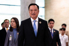 Bhumjaithai Party leader Anutin Charnvirakul arrives at parliament in Bangkok on September 5, 2025. 