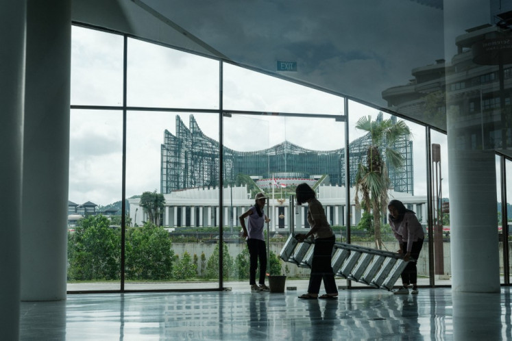 This picture taken on August 14, 2025 shows civil servants working in Ibu Kota Nusantara (IKN), the planned new capital in East Kalimantan. 