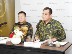 J.P. Morgan expects earnings to improve amid a rising stock market