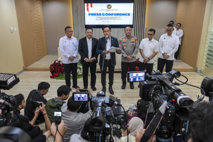 (Left to right) Deputy Coordinating Minister for Political and Security Affairs Lodewijk Pulus, Deputy Minister of Law and Human Rights Otto Hasibuan, Coordinating Minister for Law, Human Rights, Immigration and Correctional Affairs Yusril Ihza Mahendra, Deputy Chief of the Indonesian National Police Commissioner General Dedi Prasetyo, Deputy Minister of Communication and Digital Nezar Patria, and Deputy Chief of the State Intelligence Agency Imam Sugianto attend a press conference after a ministerial coordination meeting on follow-up plans for handling post-protest situations on September 8, 2025. 