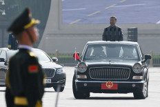China's President Xi Jinping inspects the troops during a military parade marking the 80th anniversary of victory over Japan and the end of World War II, in Beijing's Tiananmen Square on Sept. 3, 2025.