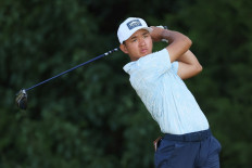 Nguyen Anh Minh of Vietnam hits a tee shot on the fifth hole in the Final match against Hamilton Coleman on July 26 during the US Junior Amateur at Trinity Forest Golf Club in Dallas, Texas.