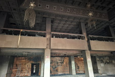 A general view shows the charred remains of the Parliament building in Kathmandu on September 10, 2025. At least 19 people were killed during rallies a day earlier, one of the deadliest crackdowns in years which fueled public anger. 