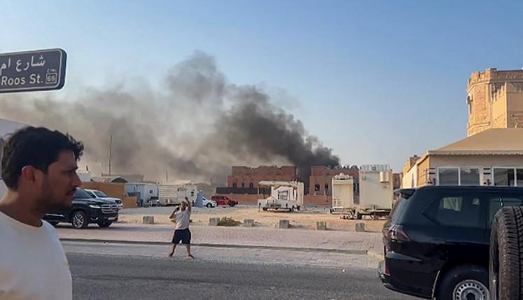 This frame grab taken from AFPTV footage shows smoke billowing after explosions in Qatar's capital Doha on Sept. 9, 2025. An Israeli military official told AFP that the military had carried out air strikes on Doha on Sept. 9 in an operation targeting senior leaders of Palestinian militant group Hamas.