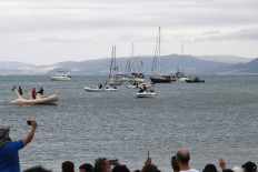 Supporters and activists of the Global Sumud Flotilla gather at the Tunisian port of Sidi Bou Said, ahead of the scheduled departure to the Gaza Strip to break Israel's blockade on the Palestinian territory on September 10, 2025. Organizers of the flotilla named 'Sumud', an Arabic word meaning steadfastness, which carries aid and pro-Palestinian activists, said late September 9 that another of their boats had been struck in a suspected drone attack off Tunisia's coast. 