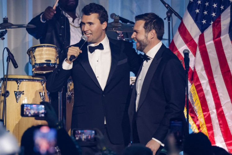 Charlie Kirk introduces US Vice President-elect JD Vance on stage during the Turning Point USA Inaugural-Eve Ball at the Salamander Hotel on January 19, 2025 in Washington, DC.   