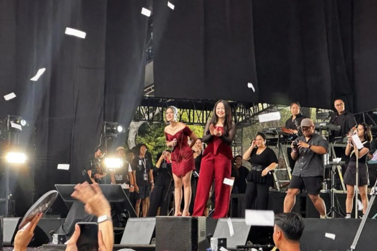 Pop singers Raisa (center left) and Bernadya perform during the Pestapora 2025 music festival on Sept. 6 at Gambir Expo & Hall D2 JIEXPO in Kemayoran, North Jakarta.
