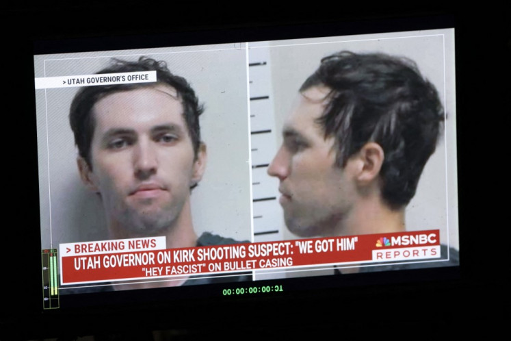 A TV monitor displays a picture of Tyler Robinson, the suspected of killing Charlie Kirk on Sept. 11, in Orem, Utah, the United States on Sept. 12, 2025. US President Donald Trump on Friday announced that the suspect had been taken into custody over the killing of right-wing activist Charlie Kirk after a massive manhunt.