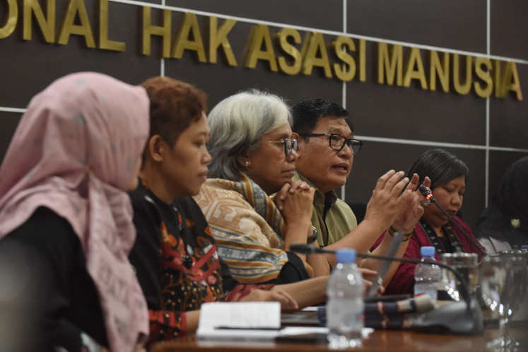 National Commission on Human Rights (Komnas HAM) commissioner Abdul Haris Semendawai (second right) sits next to Chairwoman Anis Hidayah (right), Indonesian Child Protection Commission (KPAI) commissioners Sylvana Maria (center) and Dian Sasmita (second left) as well as National Commission on Violence Against Women (Komnas Perempuan) commissioner Yuni Asriyanti during a press briefing on Sept. 12 in Jakarta. During the press briefing, the independent rights bodies announced the establishment of an independent fact-finding team to investigates violent conduct during recent nationwide riots that followed protests denouncing wealth inequality and lawmakers' lavish allowances.