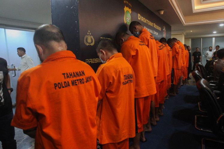 Suspects arrested in the case of kidnapping and homicide against Muhammad Ilham Pradipta, a branch head of state-owned Bank Rakyat Indonesia (BRI) in Central Jakarta, are shown during a press briefing on Sept. 16 at the Jakarta Police building in Jakarta.