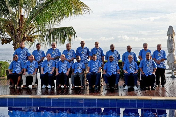 Heads of state from member countries of the Pacific Islands Forum (PIF) pose for a family photo on Sept. 11, 2025, at the PIF Leaders Meeting in the Solomon Islands capital Honiara.