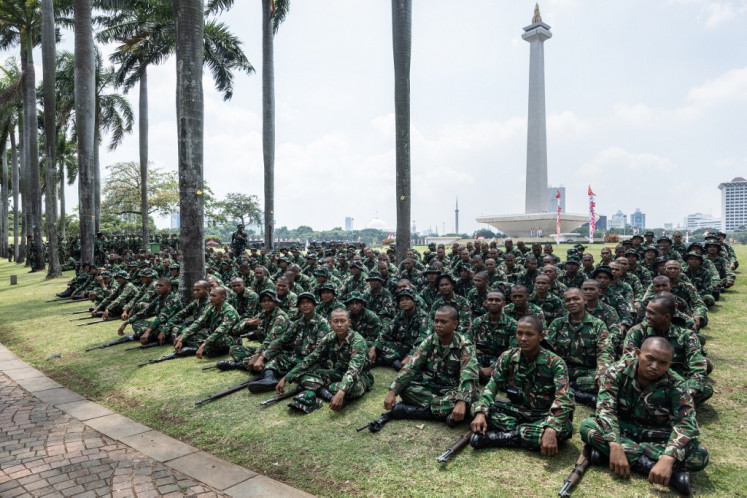 Indonesian Military (TNI) soldiers wait for orders ahead of protests at Merdeka Square in Central Jakarta on Sept. 1, 2025.