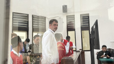 Ukrainian national Roman Nazarenko, 40, appears at a verdict hearing for his drug case at Denpasar District Court in Bali on Sept. 18, 2025. He was sentenced to life in prison after being found guilty of operating a clandestine drug laboratory in Canggu, Badung regency.