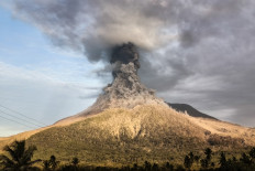 Mount Lewotobi Laki-laki erupts as seen from Pululera village in East Nusa Tenggara (NTT) on August 18, 2025.