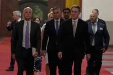 Rep. Adam Smith, (D-WA), leads a bipartisan group of US lawmakers including Chrissy Houlahan, Democratic member of House Armed Services Committee, Michael Baumgartner, Republican member of House Foreign Affairs Committee, Ro Khanna, Democratic member of House Armed Services Committee and David Perdue, US Ambassador to China for a meeting with Chinese Premier Li Qiang at the Great Hall of the People  in Beijing on Sept. 21, 2025.