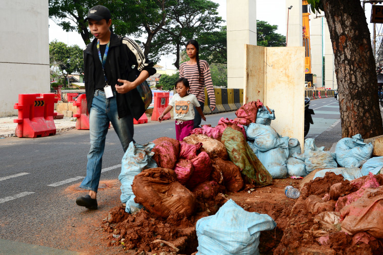 Dug up: Unfinished excavation work hinders pedestrian mobility on Sept. 22, 2025, in Jakarta.