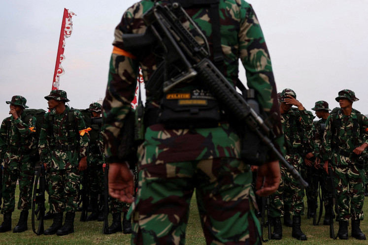 Indonesian military (TNI) troops prepare at the National Monument (Monas) complex for deployment on Aug. 31, amid the widespread anti-government protests and rioting over issues such as extra pay for lawmakers, in Jakarta.