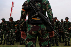 Indonesian military (TNI) troops prepare at the National Monument (Monas) complex for deployment on Aug. 31, amid the widespread anti-government protests and rioting over issues such as extra pay for lawmakers, in Jakarta.
