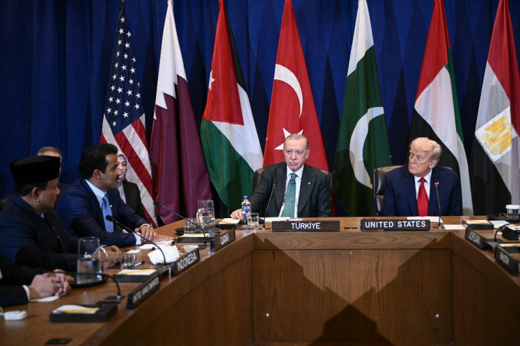 At table, L/R, President Prabowo Subianto, Qatar's Emir Sheikh Tamim bin Hamad al-Thani, Turkey's President Recep Tayyip Erdogan, and US President Donald Trump attend a multilateral meeting to discuss the situation in Gaza, on the sidelines of the United Nations General Assembly in New York City on September 23, 2025. 