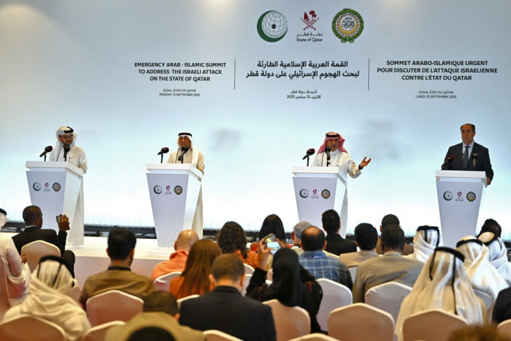Representatives of Gulf states (from left), Qatari foreign ministry spokesperson Majed al-Ansari, Gulf Cooperation Council (GCC) Secretary-General Jassim al-Budaiwi, Organisation of Islamic Cooperation (OIC) Assistant Secretary-General Youssef Al-Dobeay and Arab League Deputy Secretary-General Hossam Zaki address a press conference on Sept. 15 during the 2025 Emergency Arab-Islamic Summit in Doha.