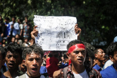 Students from several universities protest against the parliament's plan to purchase 65 SUVs for lawmakers at the National University of Timor-Leste (UNTL) in Dili, Timor-Leste on Sept. 15, 2025.