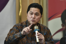 Revising regulations: Youth and Sports Minister Erick Thohir speaks at a press conference in Jakarta on Tuesday.