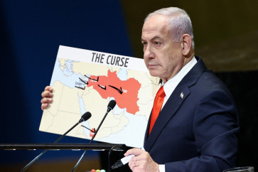 Israeli Prime Minister Benjamin Netanyahu holds a map as he speaks during the General Debate of the United Nations General Assembly at UN headquarters in New York City, the United States on Sept. 26, 2025.