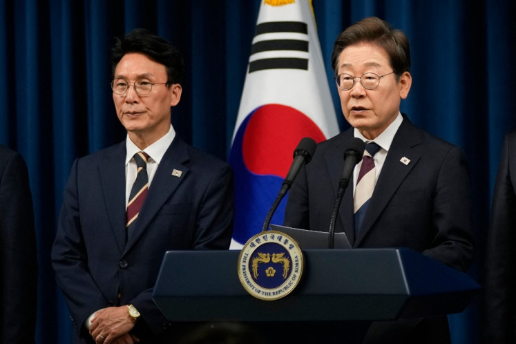 South Korea's President Lee Jae-myung (right) speaks during a press conference with Kim Min-seok, appointed as prime minister at the presidential office in Seoul, South Korea on June 4, 2025.