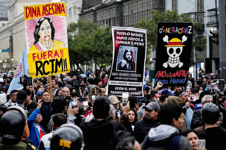 Protesters participate in a demonstration organised by a youth collective called “Generation Z“ to express discontent over a controversial pension reform plan, as well as the government of Peru's President Dina Boluarte, whose approval ratings have plummeted due to ongoing scandals and rising crime, in Lima, Peru, on Sept. 27, 2025.