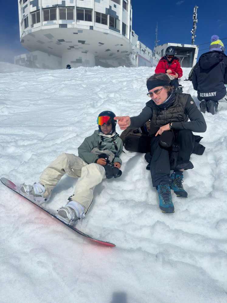 Olympic gold medalist Iouri Podladtchikov (right) coaches Zazi Landman during a training session in Switzerland.