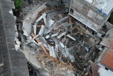 An aerial view of the collapsed building at Al Khoziny Islamic boarding school in Sidoarjo, East Java, taken on Sept. 29, 2025. At least three students were killed and dozens injured, while rescuers continue working around the clock to save those still trapped beneath the rubble.