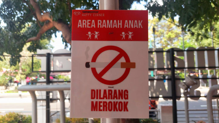 This no smoking sign is taken in a children's playground in Yogyakarta on June 27, 2024. 
