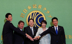 Japan's former economic security minister Takayuki Kobayashi, former LDP secretary-general Toshimitsu Motegi, Japan's Chief Cabinet Secretary Yoshimasa Hayashi, former economic security minister Sanae Takaichi, and Japan's Agriculture Minister Shinjiro Koizumi (from left to right) pose before the Liberal Democratic Party (LDP) Presidential Election Candidate Debate at Nihon Kisha Club in Tokyo on September 24, 2025.