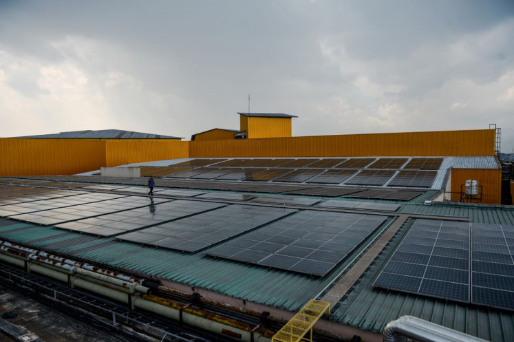 Powerful solution: A technician inspects a rooftop solar power plant (PLTS) on Sept. 8, 2025 at Trans Studio Mall in Bandung, West Java. Data from the Energy and Mineral Resources Ministry show that as of July 2025, rooftop PLTS have reached a combined installed capacity of 538 megawatt peak across 10,882 customers.

