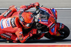 Ducati Lenovo Team's Spanish MotoGP rider Marc Marquez rides during the practice session ahead of the MotoGP Indonesian Grand Prix at the Mandalika International Circuit in Mandalika, West Nusa Tenggara on October 3, 2025.