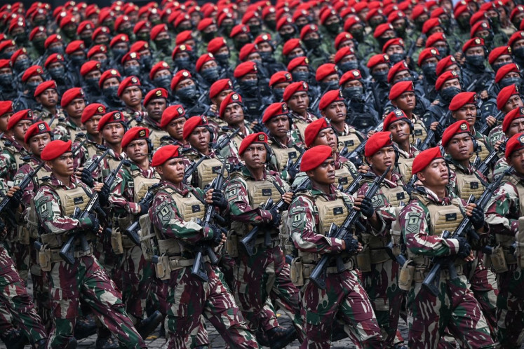 Army’s Special Forces (Kopassus) soldiers taking part in the rehearsal parade for the 80th anniversary of the Indonesian Military (TNI) at the National Monument in Central Jakarta, on Oct. 3, 2025.