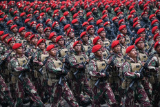 The Army’s special forces (Kopassus) soldiers take part in the troop parade during the general rehearsal for the 80th anniversary of the Indonesian Military (TNI) on Oct. 3 at the National Monument in Central Jakarta.