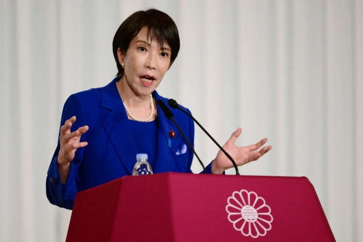 Sanae Takaichi, the newly-elected leader of Japan's ruling party, the Liberal Democratic Party (LDP), attends a press conference after the LDP presidential election in Tokyo on October 4, 2025. Conservative Sanae Takaichi hailed a “new era“ on October 4 after winning the leadership of Japan's ruling party, putting her on course to become the country's first woman prime minister.