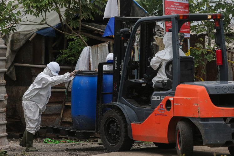 Hidden hazard: Members of the cesium-137 (Cs-137) task force wear hazmat suits on Oct. 2, 2025, as they carry out a cleanup operation for the radioactive material at the ModernCikande Industrial Estate (MCIE) in Serang, Banten. The government has designated the MCIE as a special radiation incident area after two weeks of intensive investigation and decontamination. All activities at the industrial estate have now been placed under the task force’s control to ensure thorough, measured and safe handling to protect the environment and public health.
