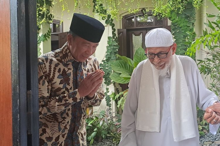 Former president Joko “Jokowi” Widodo (left) welcomes visiting Muslim cleric Abu Bakar Ba'asyir on Sept. 29, 2025  at his private residence in Surakarta, Central Java.