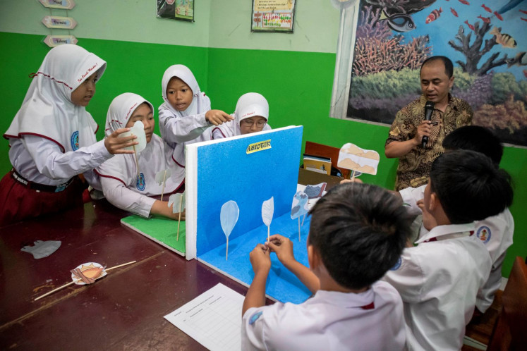 Nature lesson: Cimahi Mandiri 1 state elementary school students attend a natural science class on Sept. 22, 2025 in the city of Cimahi, West Java.