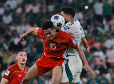 Indonesian defender Ricky Kambuaya (center) heads the ball during the 2026 World Cup Asian fourth round qualifier match between Indonesia and Saudi Arabia at the King Abdullah Stadium in Jeddah, Saudi Arabia on Oct. 8, 2025.