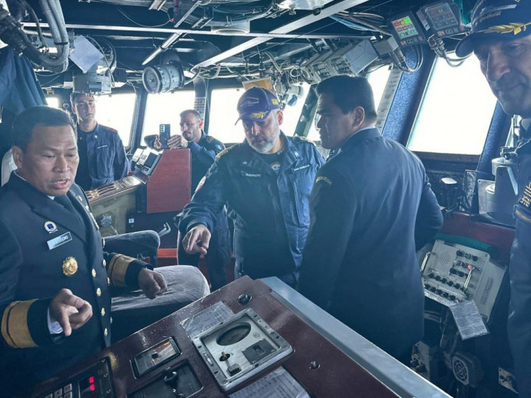Indonesian Navy chief of staff Muhammad Ali (second right) vists the bridge of Italian light aircraft carrier Giuseppe Garibaldi on May 29, 2024, during his visit to Italy. Ali said the navy could use the carrier for both war military operation and military operation other than war missions. 