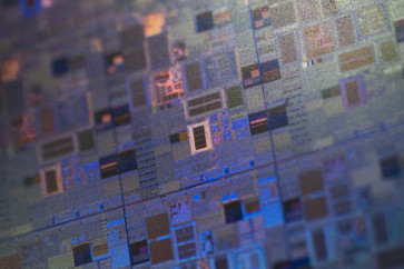 Chips on a silicon wafer are pictured at the Institute of Microelectronics of Barcelona (IMB-CNM) in Bellaterra near Barcelona, on March 3, 2022.